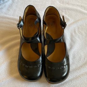 Fluevog mary Jane’s. Black leather. Rubber sole. Faux strap (elastic).square toe